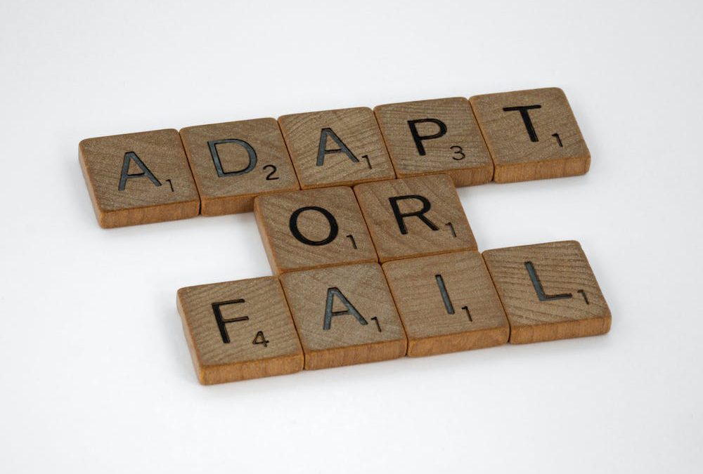 Scrabble tiles spelling out: Adapt or Fail